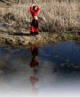 female gypsy dance near the lake