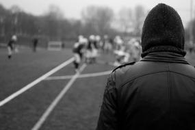 Black And white photo of Rugby Watching at Winter