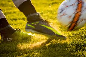 kick in soccer in blurred background