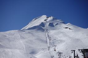 ski lift on side of Brienzer Rothorn mountain, switzerland