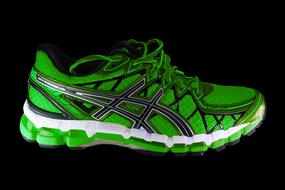 isolated green running shoes