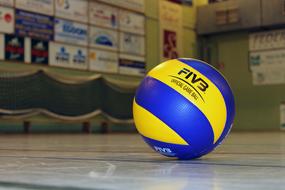 photo of yellow-blue volleyball
