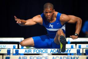 Man, jumping on the track in Colorado Springs, in Colorado, USA, in ligt