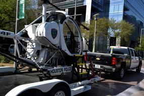 truck with Police Helicopter on road