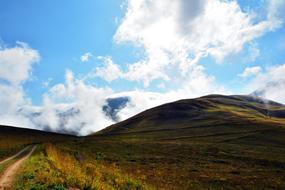 Beautiful and colorful landscape of the KaÃ§kars mountains with plants in Turkey, at blue sky with white clouds on background