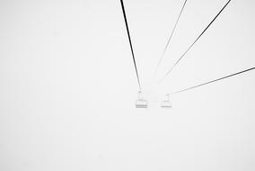 chairlift in fog
