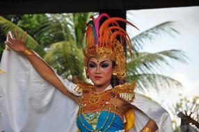 Balinese Dancer, beautiful girl in colorful headdress