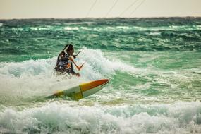 kiteboarding on high waves