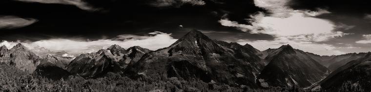 monochrome panoramic view of Switzerland Alpine Mountains