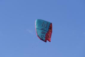 colored sail against the blue sky