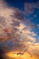 Beautiful, blue and orange sky with white clouds
