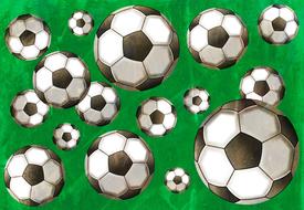 soccer balls on green as background
