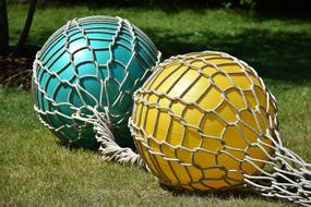 two rubber balls in nets