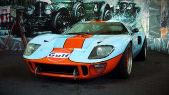 vintage white and red ford racing car