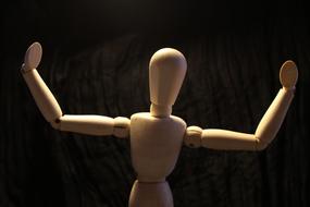 wooden mannequin as a living figurine