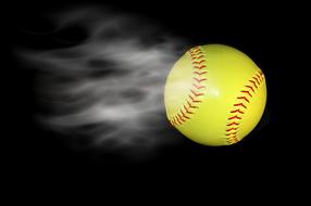 Close-up of the shiny, yellow and red baseball bole, among the white smoke, at black background, clipart