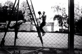 monochrome photo of Basketball Court Fence