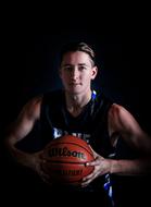 handsome sportive young man with Basketball