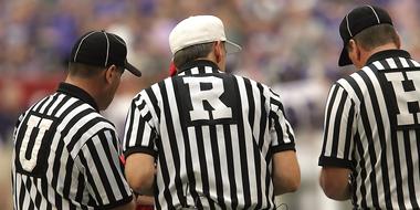 three Football Referees