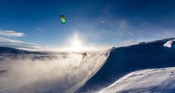 snow kiting in sunny day