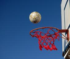 ball on a red basketball basket