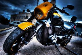 black and yellow Motorbike parked at building