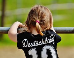 Girl Curious on Gate