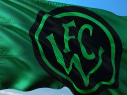 flag of Wacker Innsbruck football club at sky