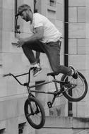 black and white photo of man with Bmx Bicycle Sports