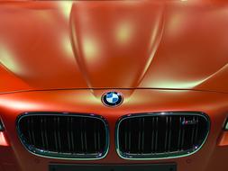 Bmw logo on red vintage Car