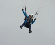 Paragliding blue sky, normandy france