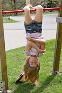 Child Girl Gymnastics on horizontal bar