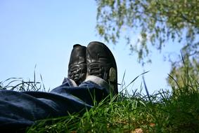 Shoes Feet Rest on grass