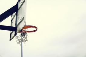 Basketball Hoop and grey sky