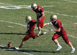 American people Football players in red uniform