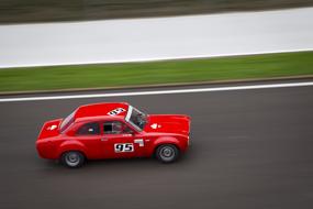 red racing car on the track