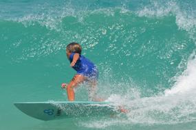 surfing young boy