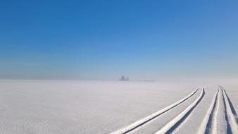 skiing tracks in sunny day
