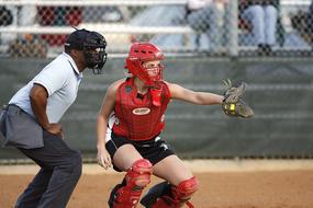 female Softball Catcher and Umpire