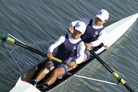 photo of two sportsmen on a kayak
