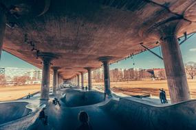 sports ground for skateboarding under the bridge