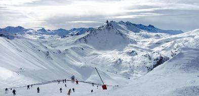 people skiing in valley at Snow Mountains