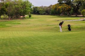 golf player in a picturesque landscape