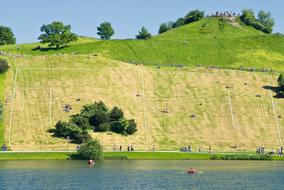 Beautiful and colorful hills, with the plants, near the water, in Munich, Germany