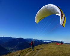 Paraglider as a leisure in the mountains on a sunny day