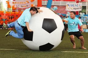 big Football ball and players