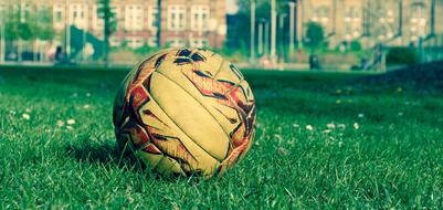 Soccer Ball on the grass in a blurred background