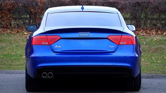 blue luxury car rear view