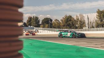 green grey Racing Car on trace