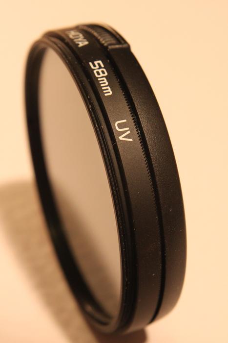 Black dslr filter of camer, with the shadow
